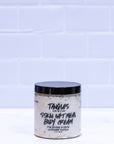 Jar of Tangles and Beyond skin oatmeal body cream on a white background
