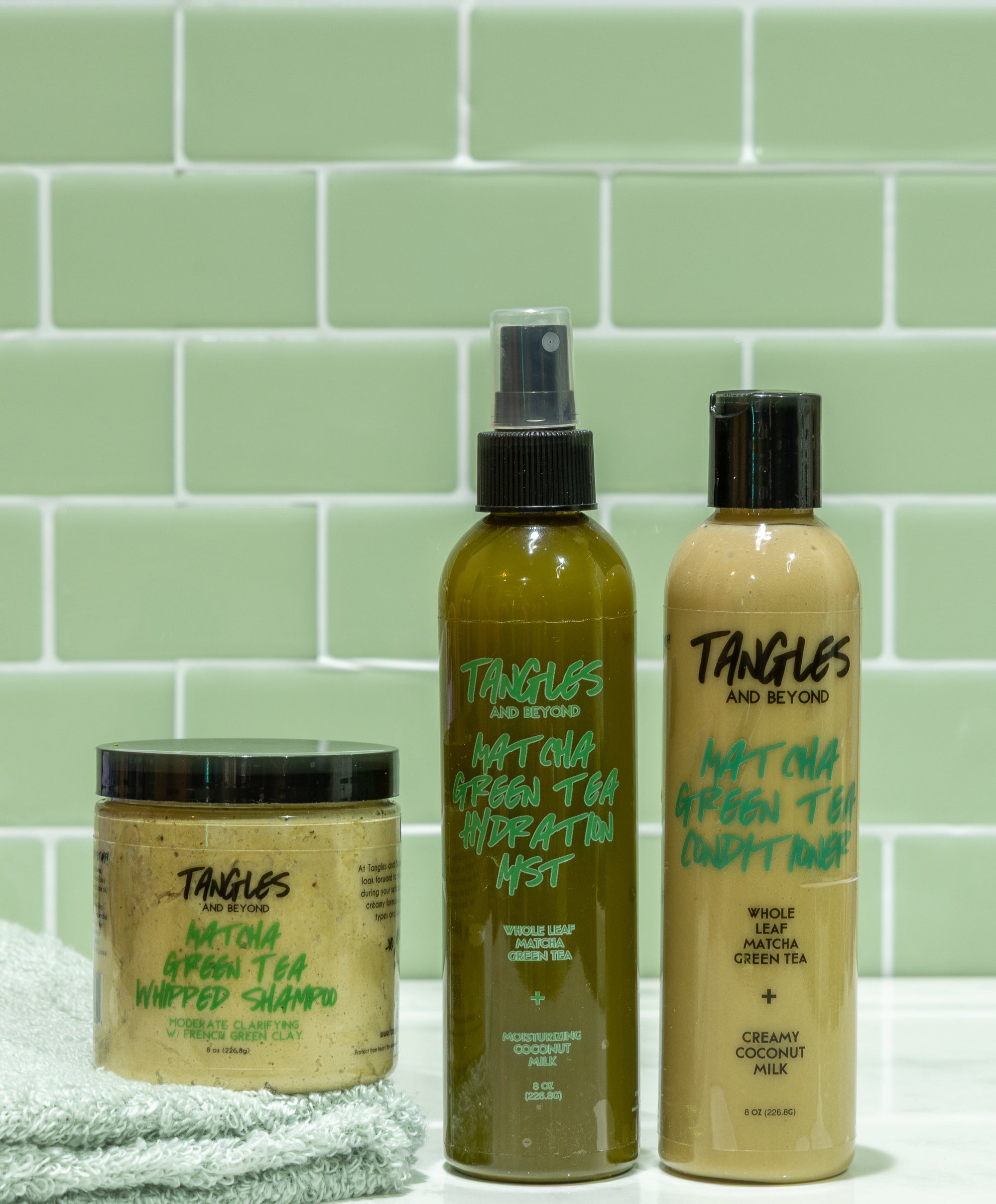 Matcha Green Tea Collection with green towel on green tiled background