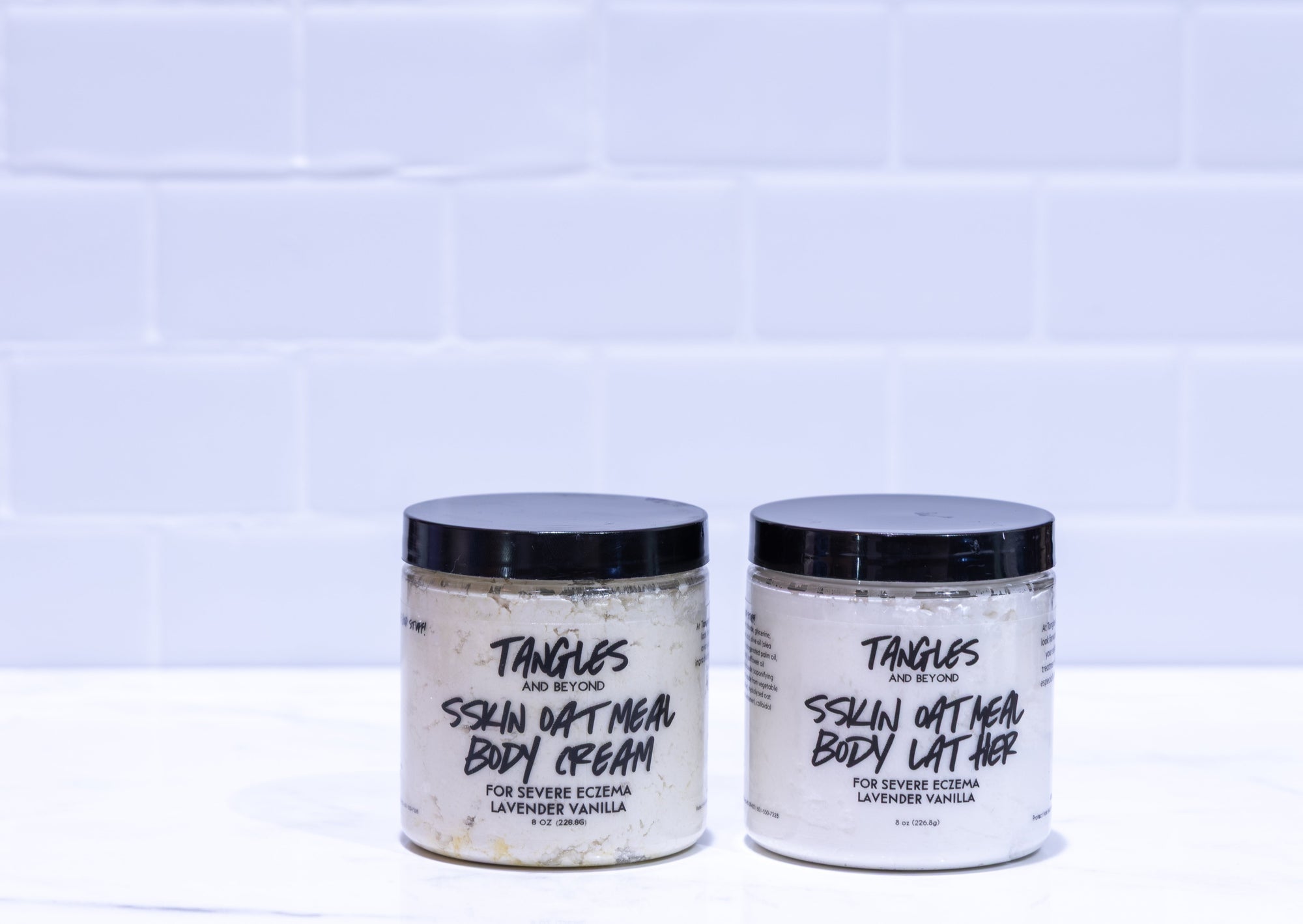 Tangles and Beyond SSKIN products on white tiled background.
