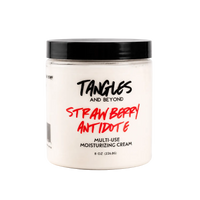 A jar of Tangles and Beyond Strawberry Antidote Multi-Use Moisturizing Cream on a clean white background.