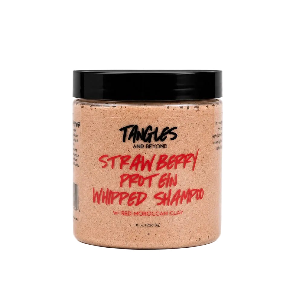 A jar of Tangles and Beyond Strawberry Protein Whipped Shampoo in Red Moroccan Clay scent, featuring a black lid and a clear container showing the beige clay-colored shampoo inside, set against a plain white background.