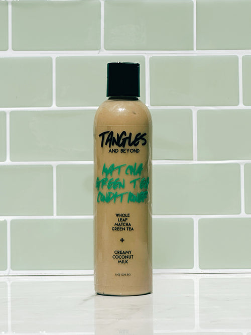 Bottle of 'Tangles and Beyond' product on a tiled wall background